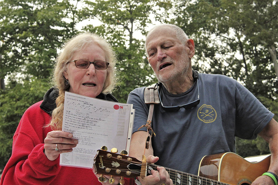 Helene Forst, Screenwriter and Storyteller, performing with guitarist